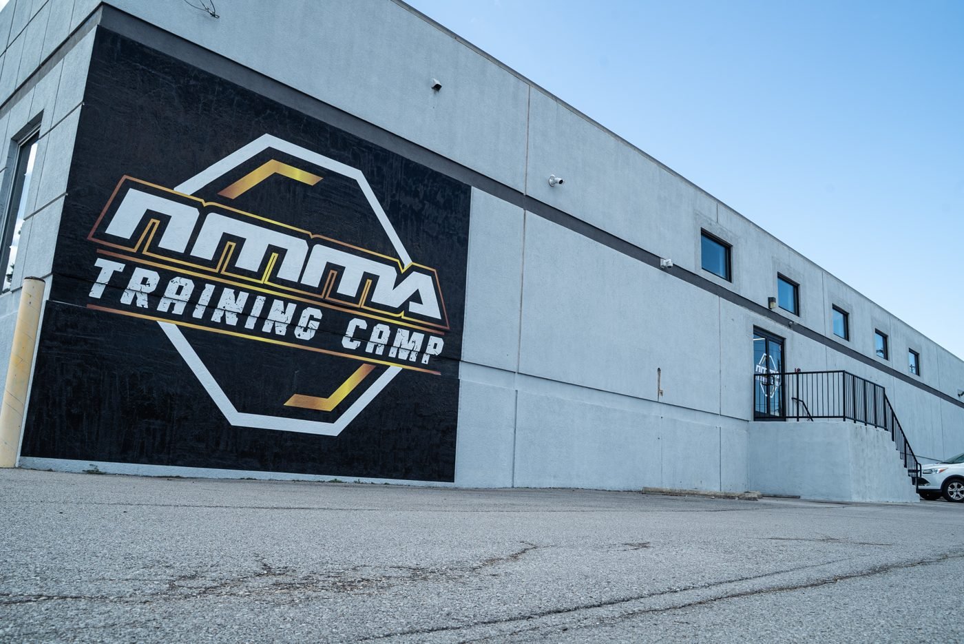 Nashville MMA Training Camp building with the NMMA wall logo
