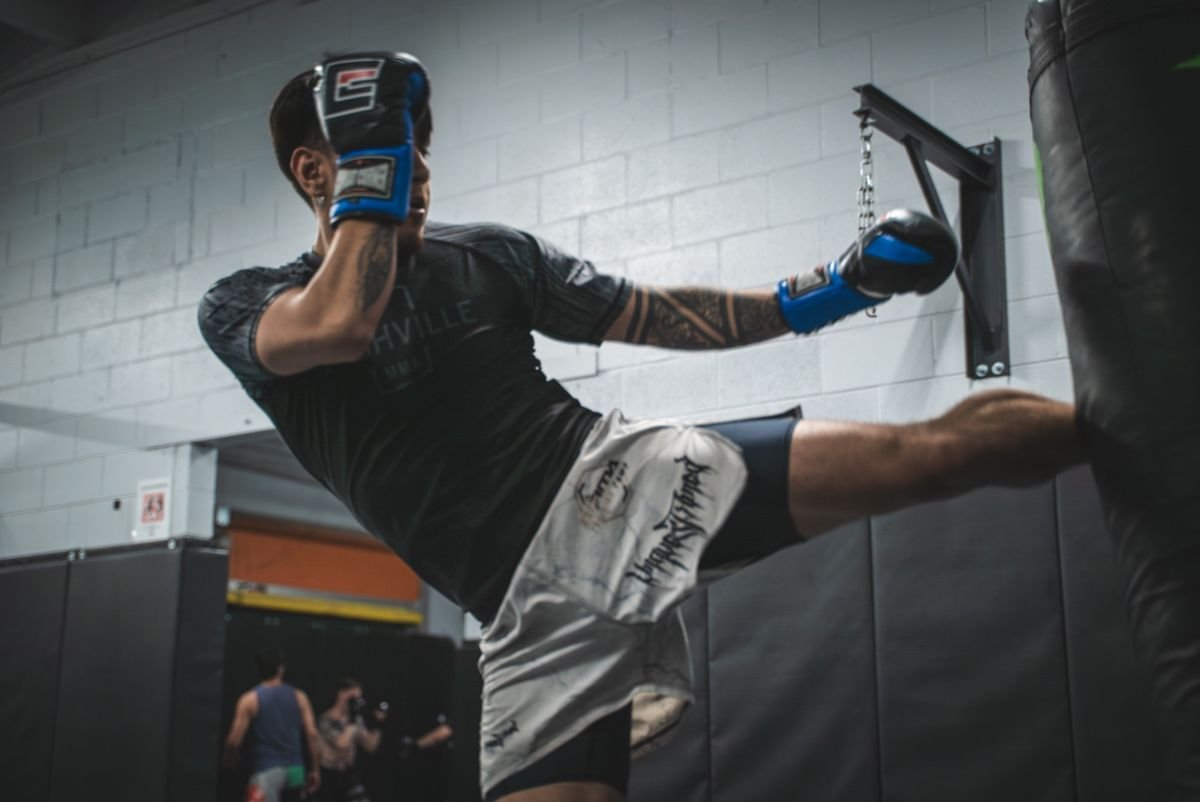 A high kick on the heavy bag